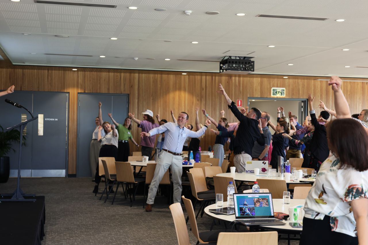Workshop participants on their feet