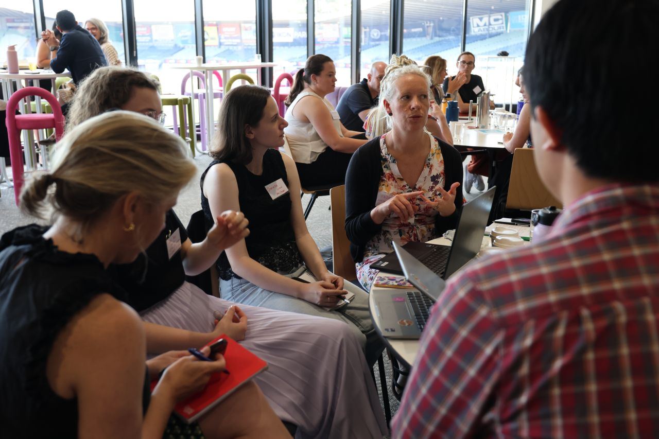 Participants in discussion at the Safe and Inclusive Sport Community of Practice